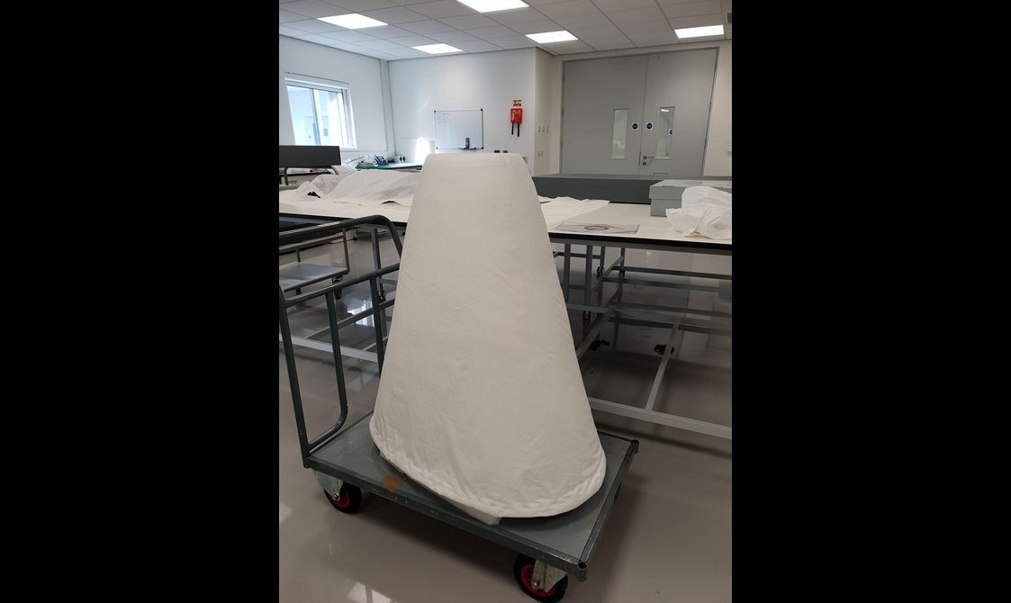A mount of plastazote covered in Tyvek on a portable tray.